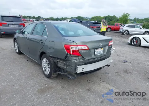 2014 Toyota Camry Le z USA, uszkodzony, nr VIN 4T4BF1FK7ER435735